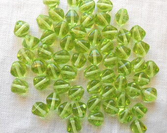 50 6mm Peridot Green bicone pressed glass Czech beads, C1250