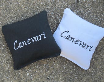 Custom Cornhole Game Bags with a Last Name - Set of 8 Shown in Black and White