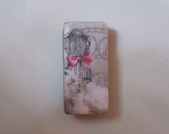 Dressmakers Dummy with Pink Bow on Clock Background Bamboo Domino Tile Magnet