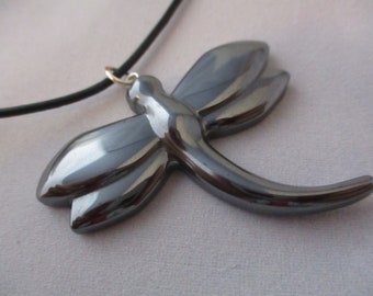 Carved hematite pendant