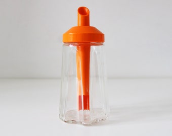 1970s orange plastic and glass sugar syrup pourer. Made in Germany by Stoha