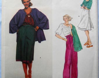 Vogue 1669. Anne Klein American Designer pattern. VTG Anne Klein fashion pattern. Jacket, wide leg pants, blouse, skirt pattern. Size 8.