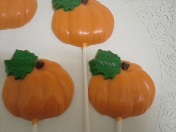 A dozen fall pumpkin lollipops