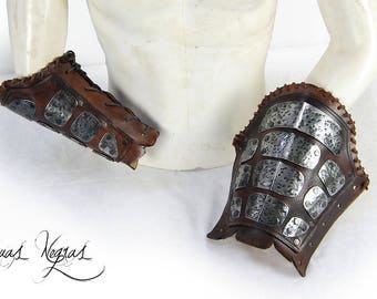 Warrior bracers made of leather and metal. Barbarian Bracers. Leather armor. Armor for LARP. Vikings bracers. Party costume. .