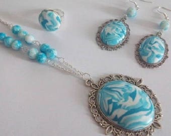 Set a long necklace, earrings and ring