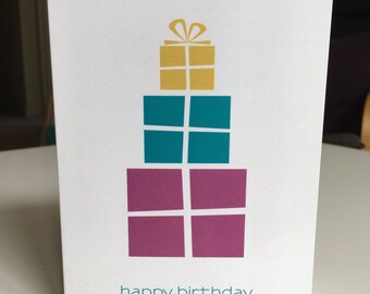 Birthday card with stack of presents