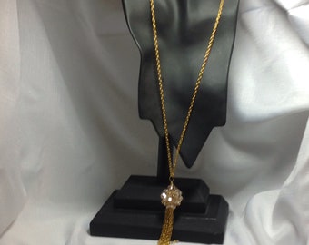 Golden beaded ead tassel necklace