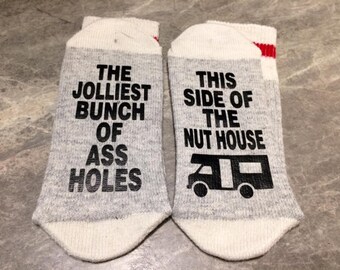 The Jolliest Bunch Of Ass Holes This Side Of The Nut House (Word Socks - Funny Socks - Novelty Socks) - with Trailer silhouette