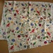 Christmas material, fabric, angels, santa claus, bows, holly, stars, trees, music, words, snowflakes, buildings, ornament, gifts, candy cane