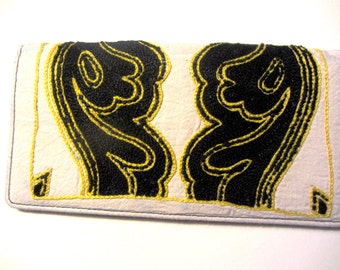 Leather wallet with hand-embroidered motif