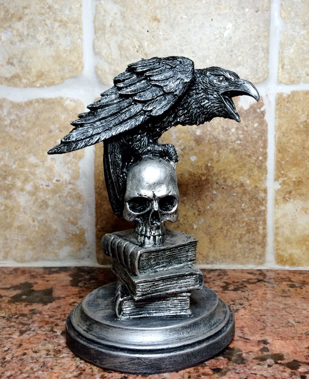 dc raven statue