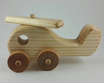 Handcrafted wooden helicopter.