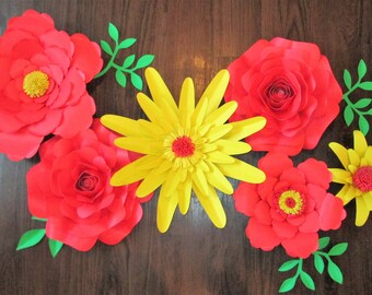 6 red and yellow paper flowers.