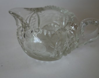 Heavy cut glass cream jug
