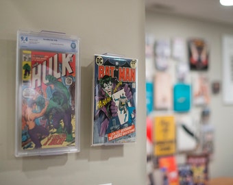 ComicMount Comic Book Display - Adjustable Wall Mount or Shelf Stand. New Patented display product developed by CollectorMount™