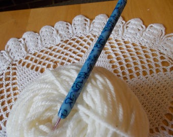 Size C Susan Bates crochet hook.