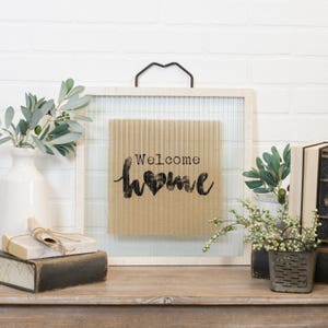 Wood and glass sign "WELCOME HOME"