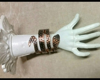 Copper snake cuff bracelet.