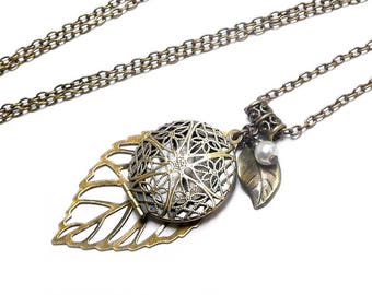 Worn necklace photo Locket pendant leaf with vintage bronze Ivory Pearl