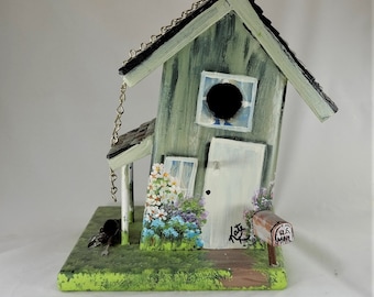Unique Slanted Birdhouse with a Porch , Handcrafted , Hand Painted with lots of Flowers and Color