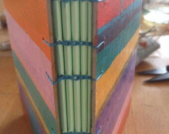 Colourful stripes little notepad, link stitched.