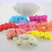 set of 12 polyester flowers in different colors