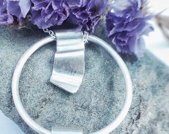 Dangling waves, made in sterling silver for them