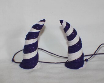 Purple and white twisted devil inspired horns with purple glitter