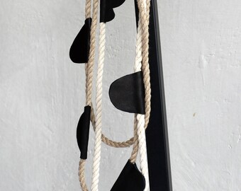 Layered statement rope necklace.