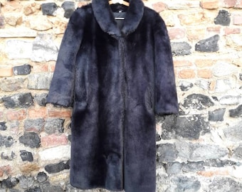 The black fur 100% Acrylic 70's coat