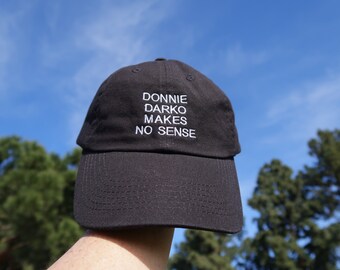 Black Dad Cap Donnie Darko Makes No Sense Low Profile Hat **Free Domestic Shipping**