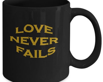 Love Never Fails Coffee Mug
