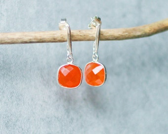 Silver earrings massif and carnelian orange