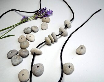 Drilled pebbles (20 pieces) from the Latvian Baltic Sea coast. Pebbles with hole for necklaces and bracelets.