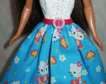 Handmade Barbie clothes - blue and white dress