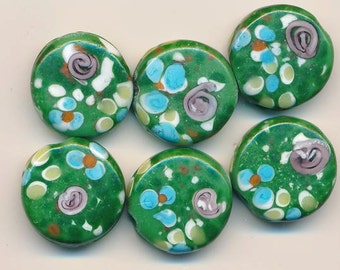 Six gorgeous spring-like lampwork glass beads - semi-matte variegated green background with flowers - 20 mm flat disks