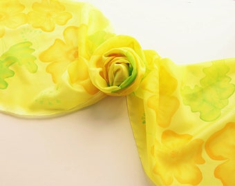 Hand painted silk scarf. Handpainted silk scarf. Yellow silk scarf with yellow flowers and green leaves. 14 x 71", 35 x 180 cm.