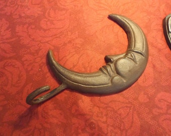 Cast iron hook wall hanger moon. New old stock. Gift idea. 10" (25 cm) H x 5.5" (14 cm) W . Ready to hang.