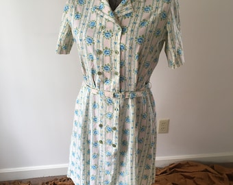60s floral dress with double breasted buttons and belt / A Dixie Lou Frock