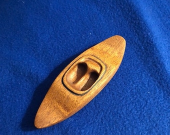 Handcrafted wooden canoe