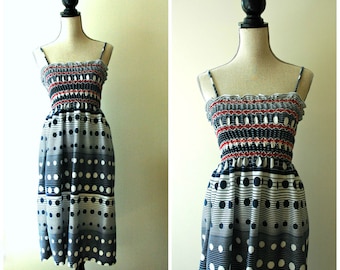 Adorable vintage red, white and blue polka dot ombre spaghetti strap sundress.