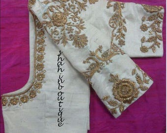Attractive White blouse with gold floral threadwork silk saree Blouse