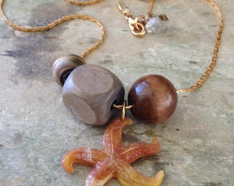 40% OFF ERRYTHANG // use code: ERRYTHANG // one of a kind handmade starfish wooden beaded necklace.