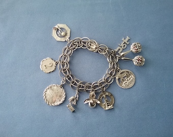 Vintage Sterling Silver Charm Bracelet with 9 charms