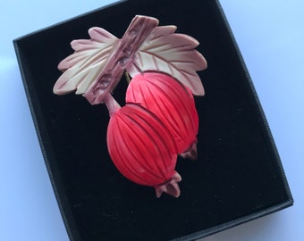 Vintage celluloid hat flash or lapel pin c.1930s - rosehips or berries