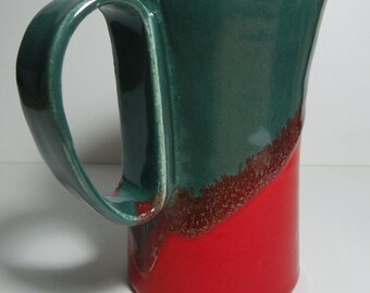 Ceramic coffee mug in stunning red and green design