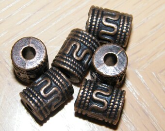 6 - Antiqued copper-finished "pewter" (zinc-based alloy), 13x10mm cylinder, 4mm hole.