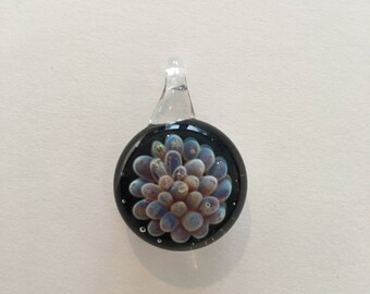 Purple flower implosion pendant