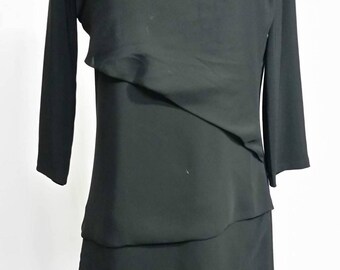 Black dress with ruffles trimmed