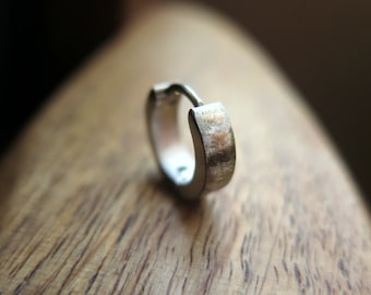 silver hoop earring for men. men's jewelry in brushed stainless steel.